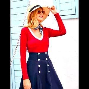 Red sweater white trim